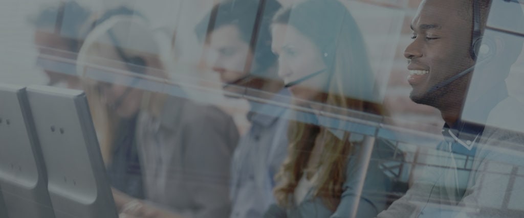 A group of people in a call center